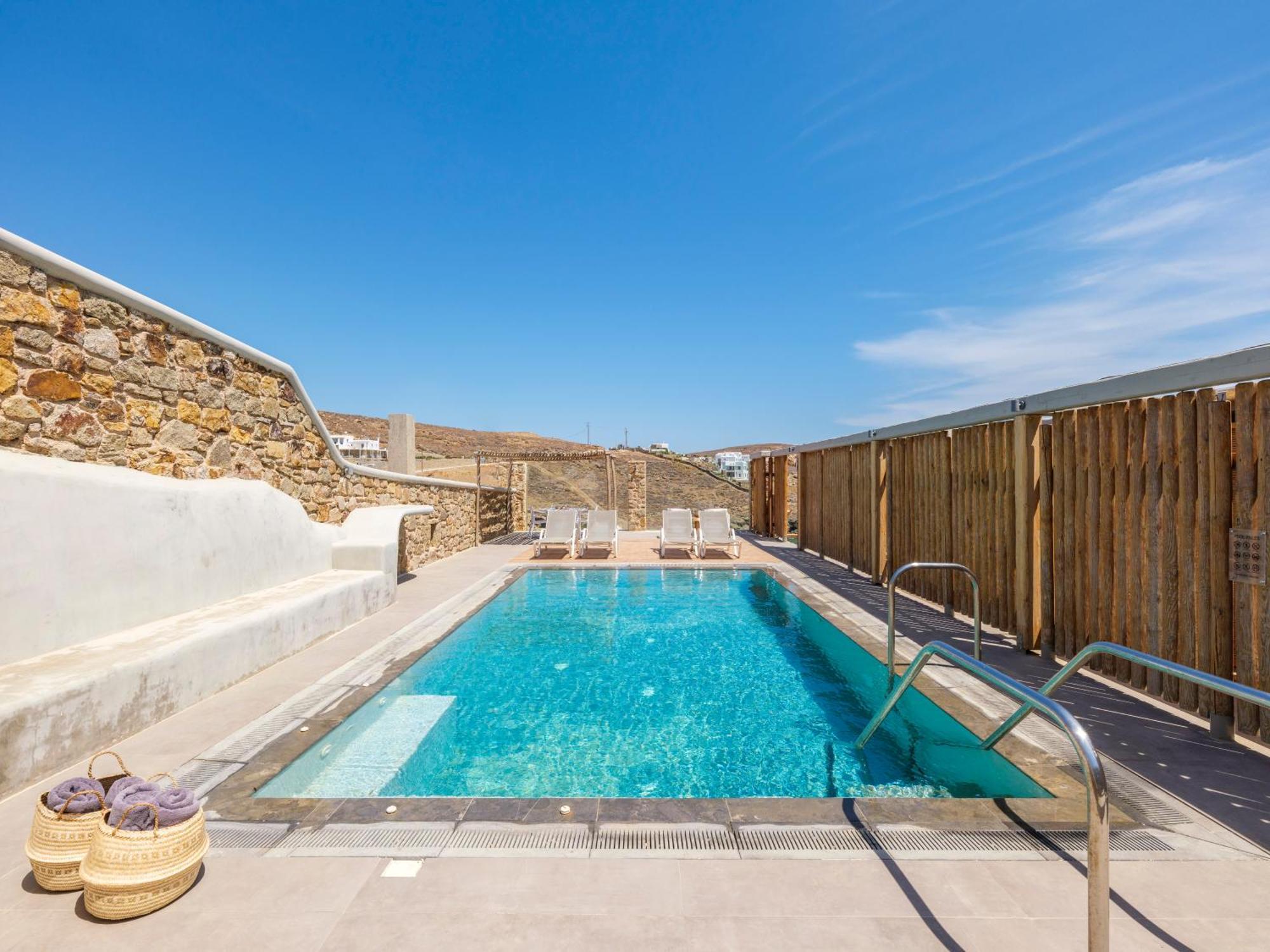 The Mykonist Merchia Beach Villas & Suites Exterior photo